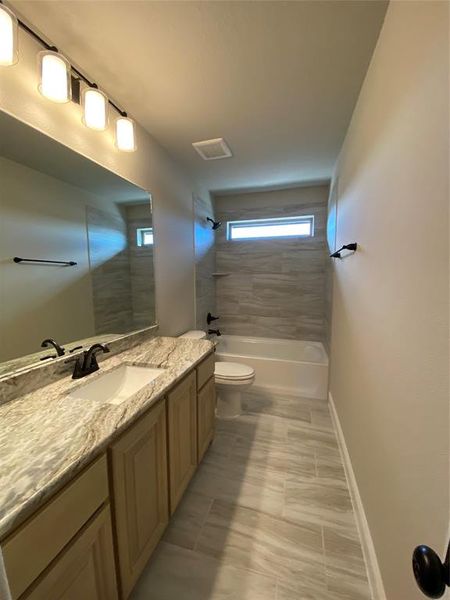 Bath 3 has window for natural light, granite, and 12x24 tile Bath 3 has window for natural light, granite, and 12x24 tile