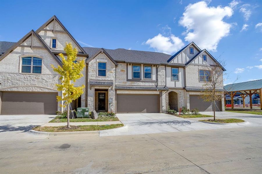 Front exterior of a new home in , Mansfield, TX, highlighting curb appeal (Image 22).