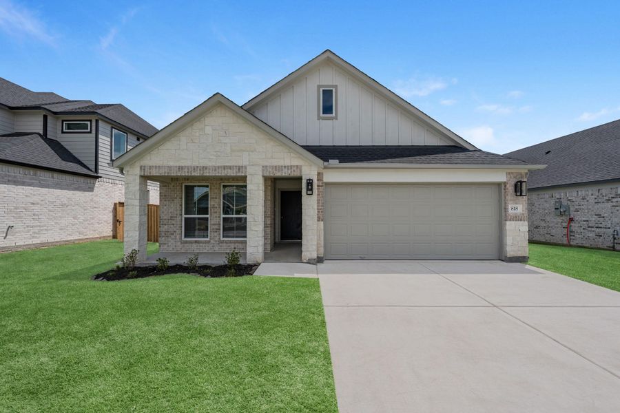 Front exterior of a new home in Huntington Place, Rosharon, TX, highlighting curb appeal (Image 2). Front exterior of a new home in Huntington Place, Rosharon, TX, highlighting curb appeal (Image 2).