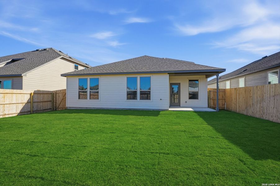 Exterior details and patio area of a home in Dove Song, Marion (Image 3).