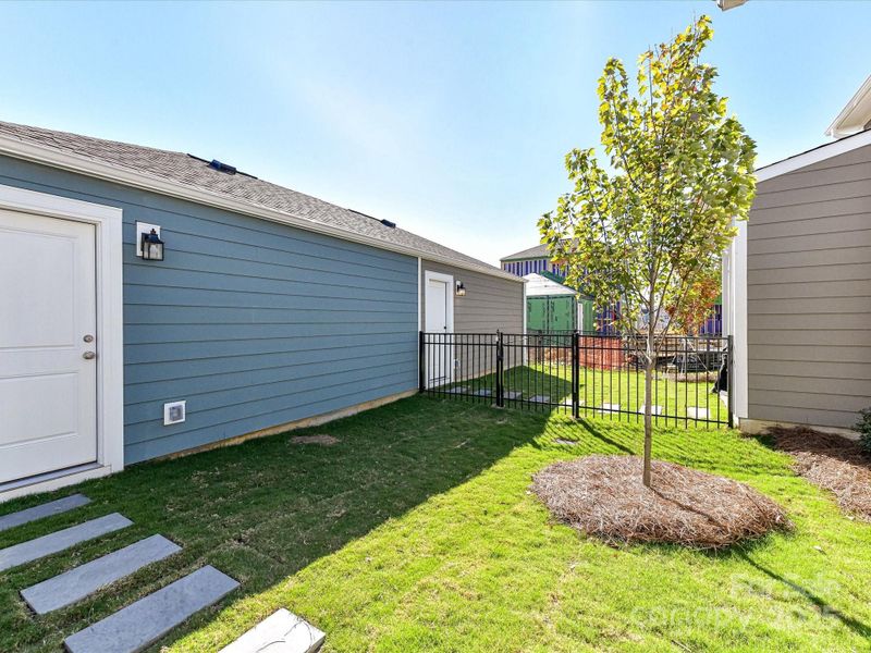 Exterior details and patio area of a home in North Creek Village, Huntersville (Image 4). Exterior details and patio area of a home in North Creek Village, Huntersville (Image 4).