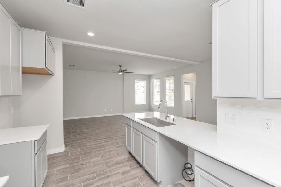 Sample photo of completed home with similar floor plan. Actual colors and selections may vary.