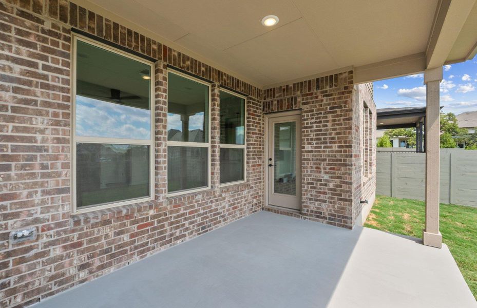 Exterior details and patio area of a home in Wolf Ranch, Georgetown (Image 19).
