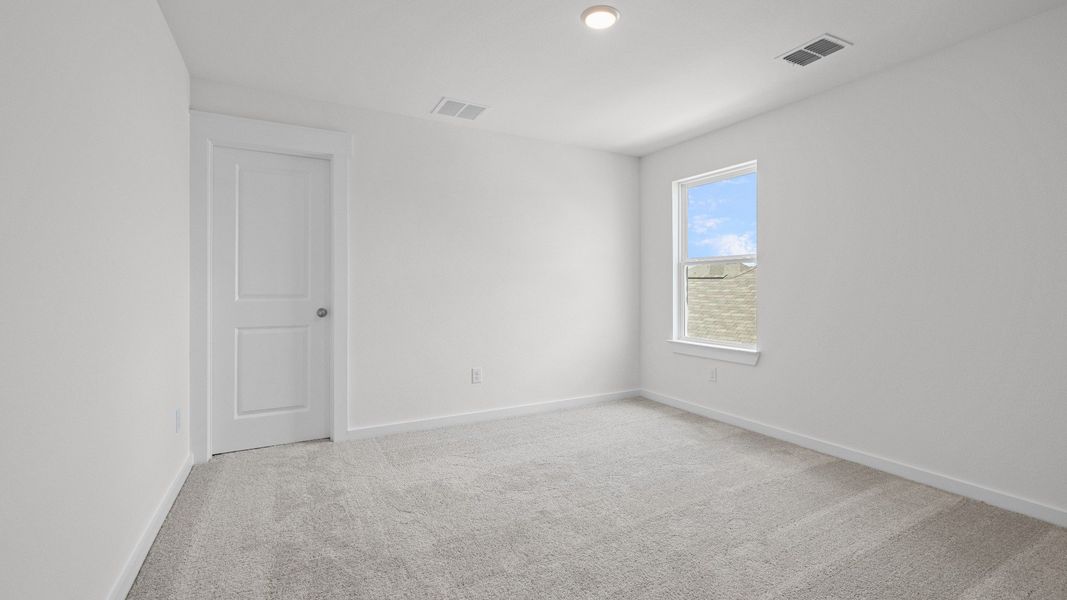 Furnished interior view inside a new home in Cielo, Conroe (Image 22).