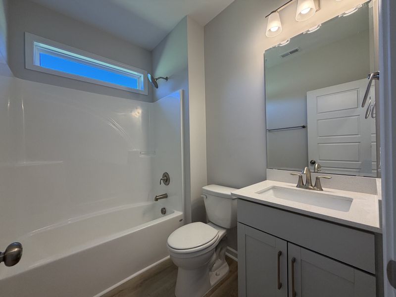 Furnished interior view inside a new home in Waterfall Estates, Whiteville (Image 9).