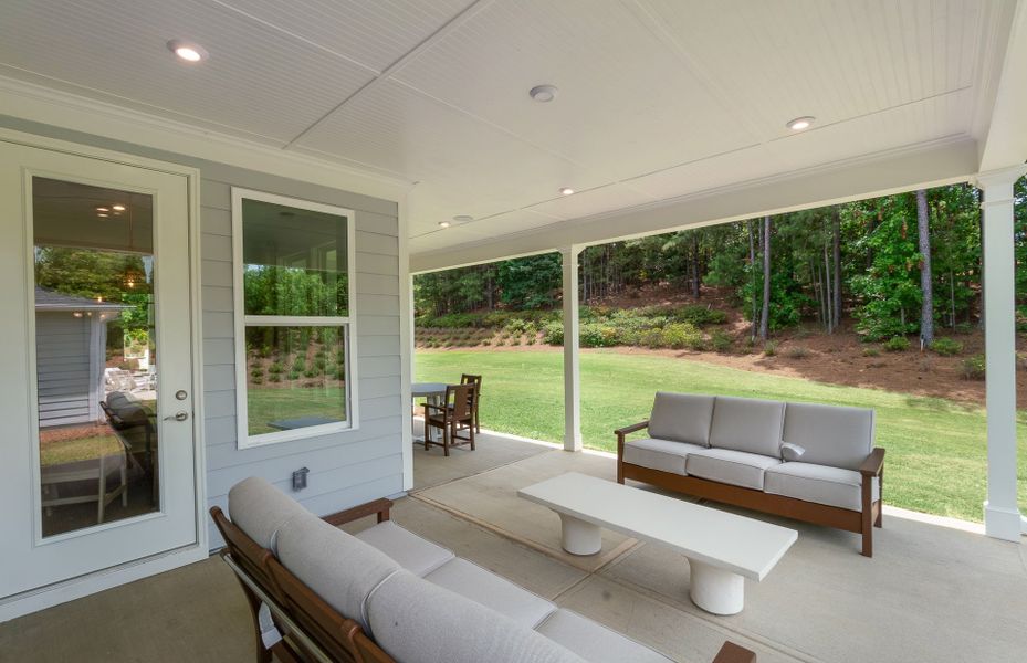 Exterior details and patio area of a home in Del Webb at Lake Oconee, Greensboro (Image 25).