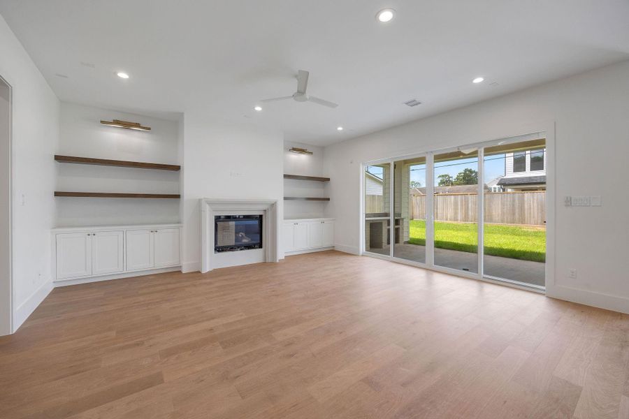 Inside, sunlight pours through expansive windows, illuminating refined architectural details. Inside, sunlight pours through expansive windows, illuminating refined architectural details.