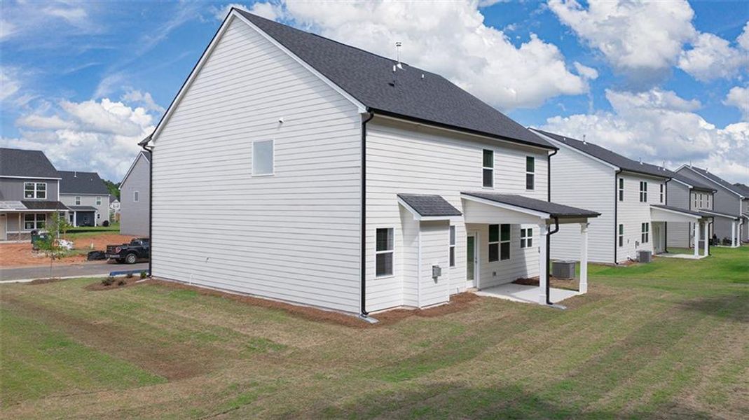 Front exterior of a new home in Preserve at Dove Creek, Statham, GA, highlighting curb appeal (Image 23).