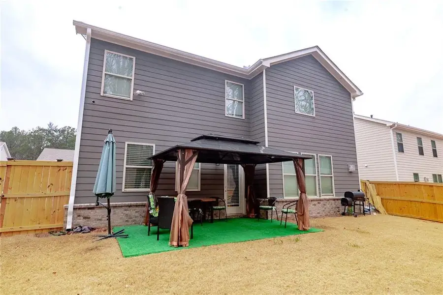 Exterior details and patio area of a home in , Lawrenceville (Image 23).