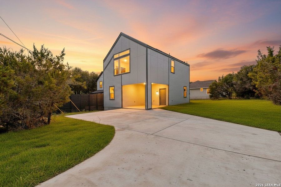 Front exterior of a new home in , Canyon Lake, TX, highlighting curb appeal (Image 1). Front exterior of a new home in , Canyon Lake, TX, highlighting curb appeal (Image 1).