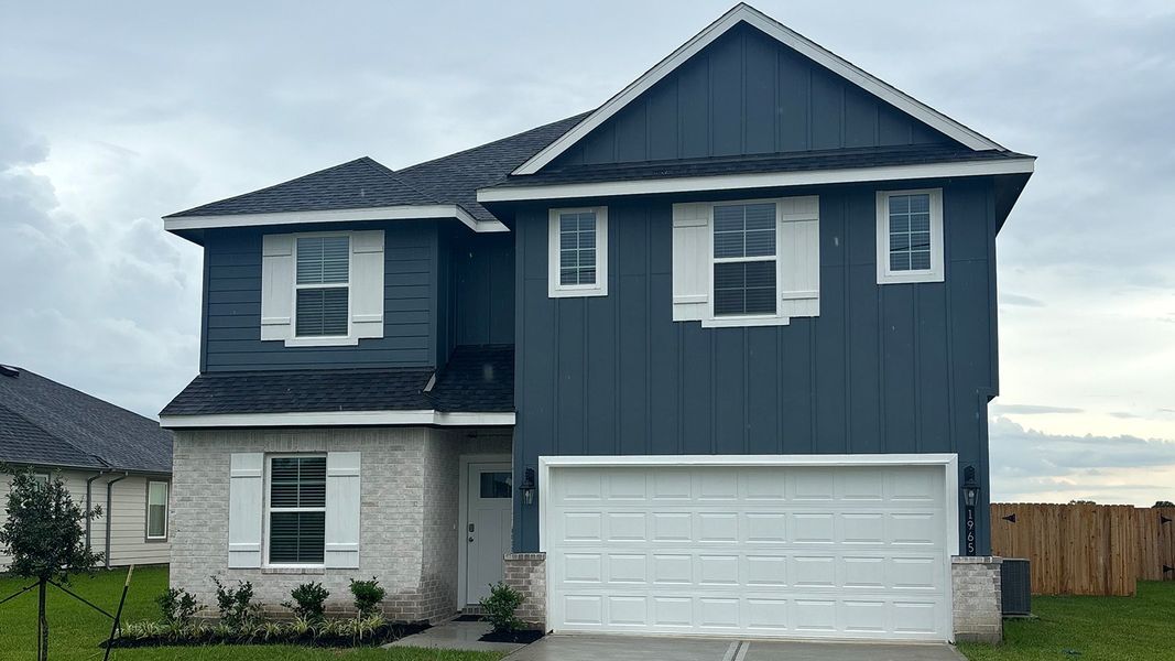 Front exterior of a new home in Highland Village, Nome, TX, highlighting curb appeal (Image 1). Front exterior of a new home in Highland Village, Nome, TX, highlighting curb appeal (Image 1).