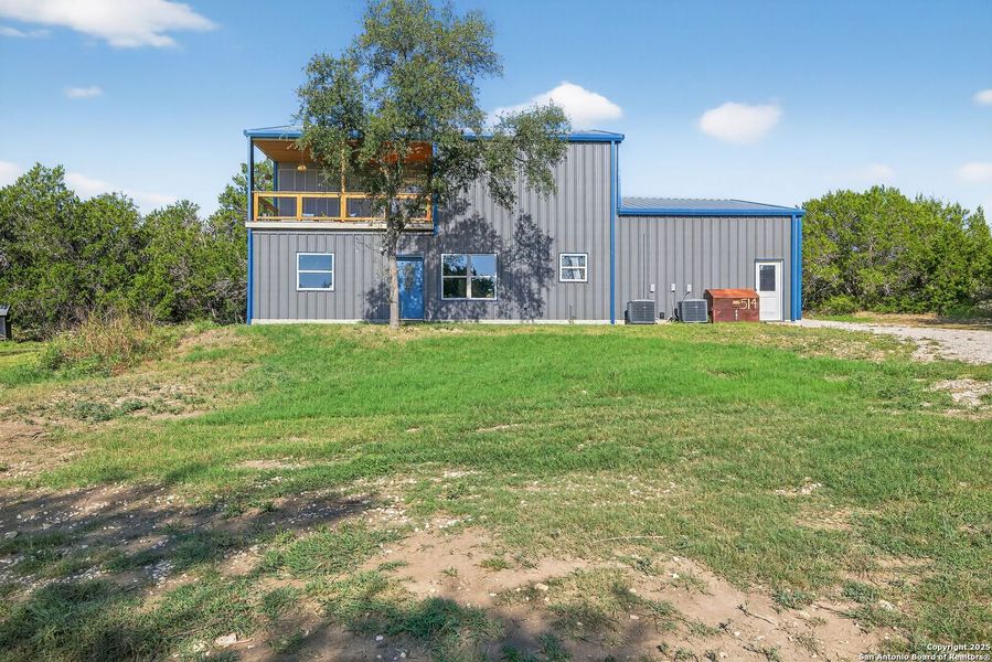 Front exterior of a new home in , Bandera, TX, highlighting curb appeal (Image 20). Front exterior of a new home in , Bandera, TX, highlighting curb appeal (Image 20).