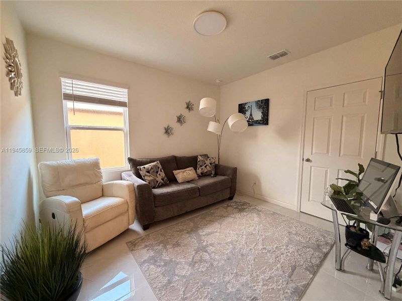 Furnished interior view inside a new home in , Port St. Lucie (Image 32).
