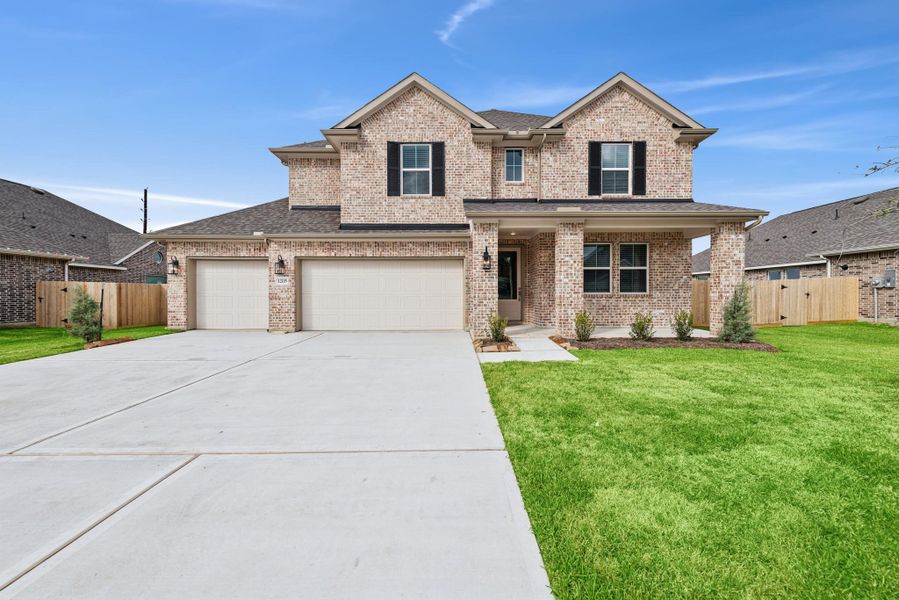 Impressive Santa Fe home design by K. Hovnanian Homes in elevation PN built in St. Augustine Meadows.