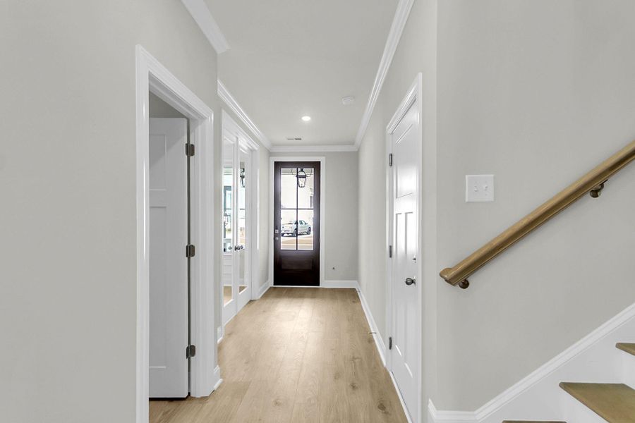 Spacious, unfurnished interior of a new home in Tidewater at Lakes of Cane Bay, Summerville (Image 19).