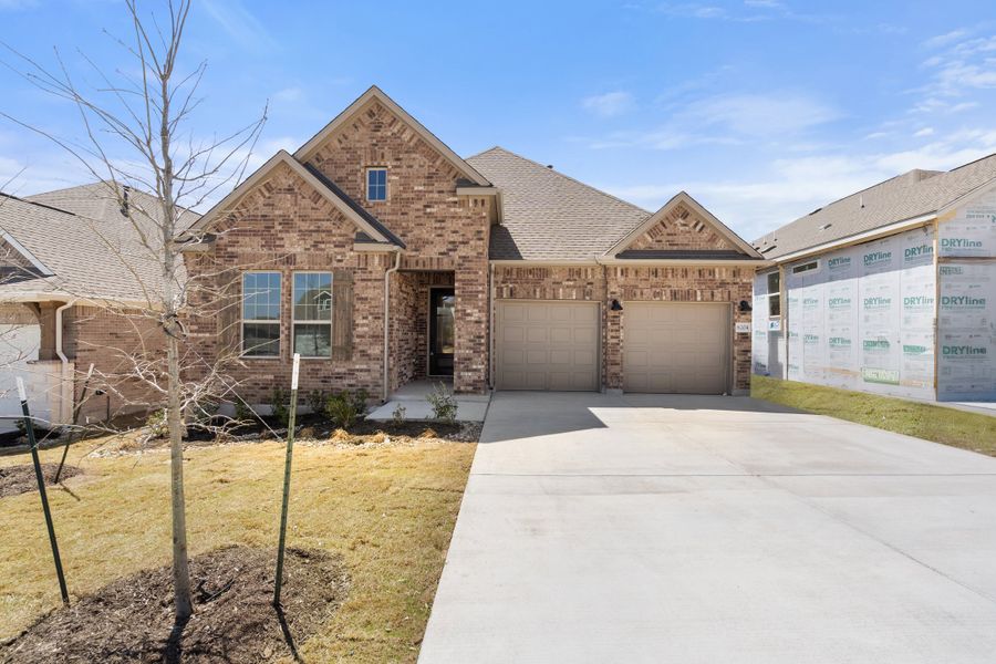 Representative exterior photo of a completed home built from the Sawgrass by Ashton Woods in Berry Creek Highlands, Georgetown, TX (Image 2). Representative exterior photo of a completed home built from the Sawgrass by Ashton Woods in Berry Creek Highlands, Georgetown, TX (Image 2).