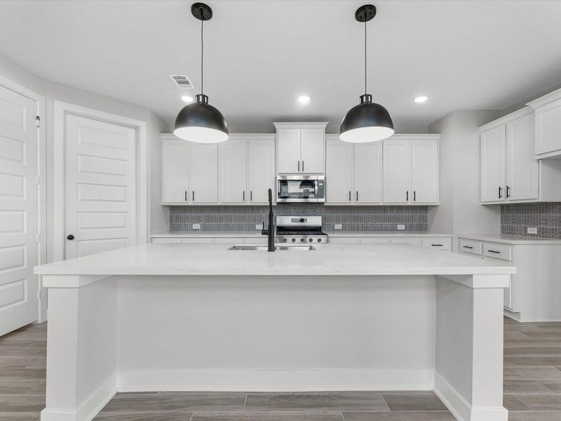 Furnished interior view inside a new home in Sienna, Missouri City (Image 4).