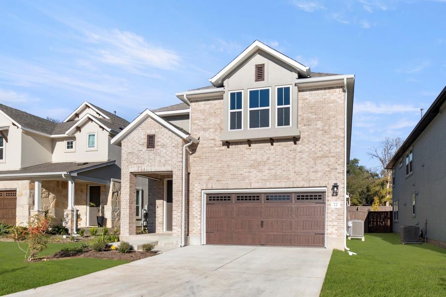Front exterior of a new home in Clear Creek, Round Rock, TX, highlighting curb appeal (Image 25).