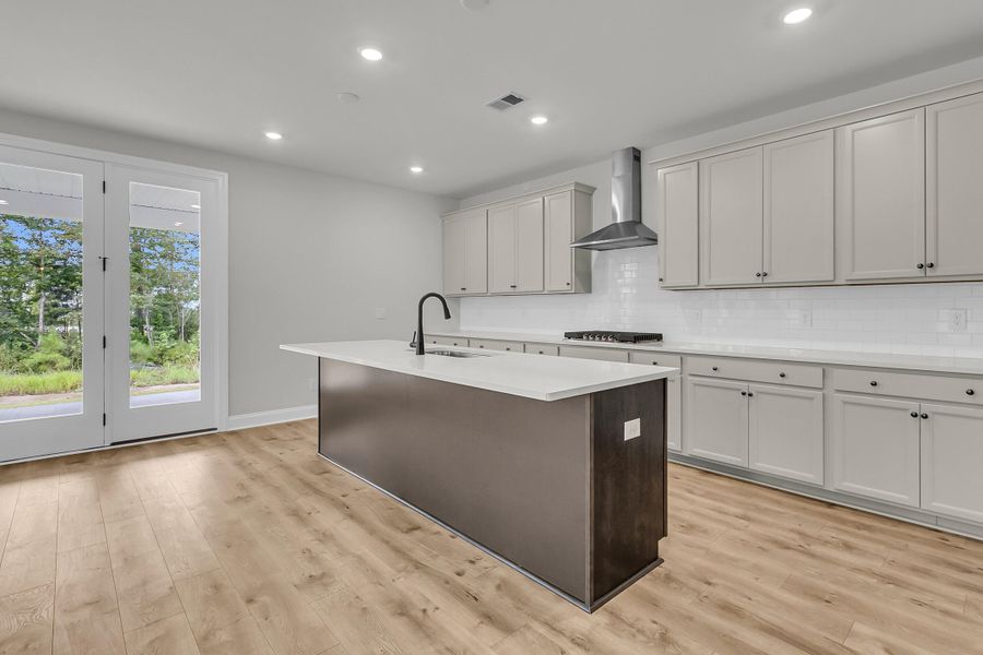 Furnished interior view inside a new home in Tidewater at Lakes of Cane Bay, Summerville (Image 9).