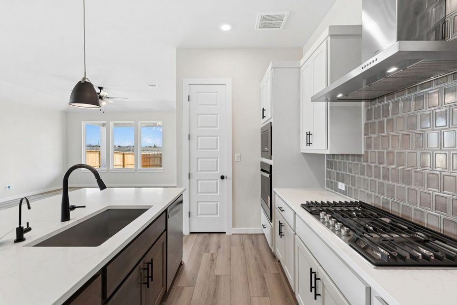Furnished interior view inside a new home in University Heights, Round Rock (Image 7).