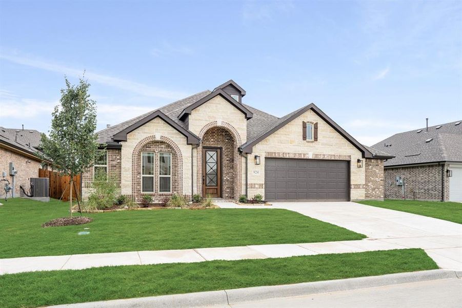 Front exterior of a new home in West Crossing, Anna, TX, highlighting curb appeal (Image 23). Front exterior of a new home in West Crossing, Anna, TX, highlighting curb appeal (Image 23).