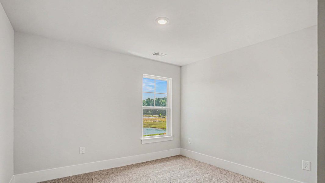 Representative unfurnished interior of a home built from the Mackenzie2 by D.R. Horton in Chapman Village, Conway (Image 11).