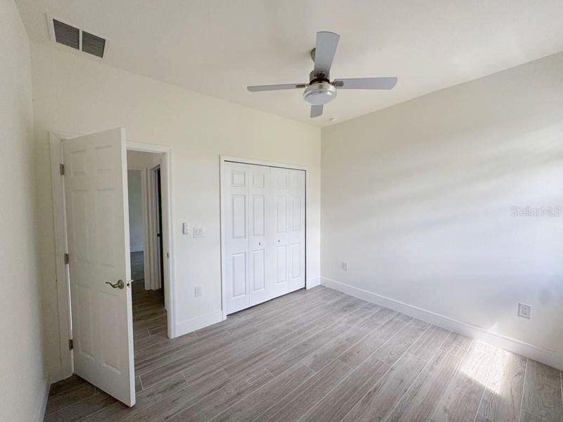 Spacious, unfurnished interior of a new home in , Port Charlotte (Image 13).