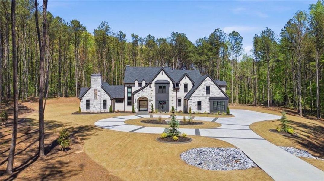 Front exterior of a new home in , Tyrone, GA, highlighting curb appeal (Image 22).