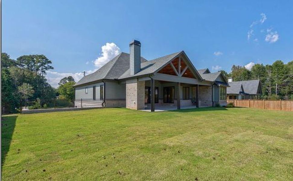 Front exterior of a new home in , Cumming, GA, highlighting curb appeal (Image 44).