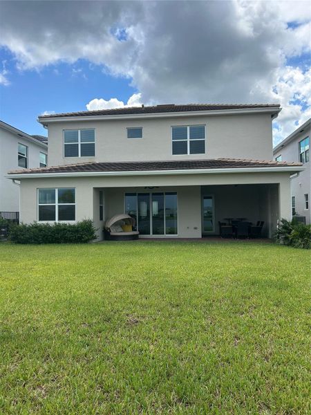 Exterior details and patio area of a home in , Loxahatchee (Image 2).