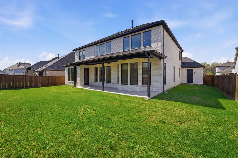 Exterior details and patio area of a home in Sonoma Verde, Rockwall (Image 32).
