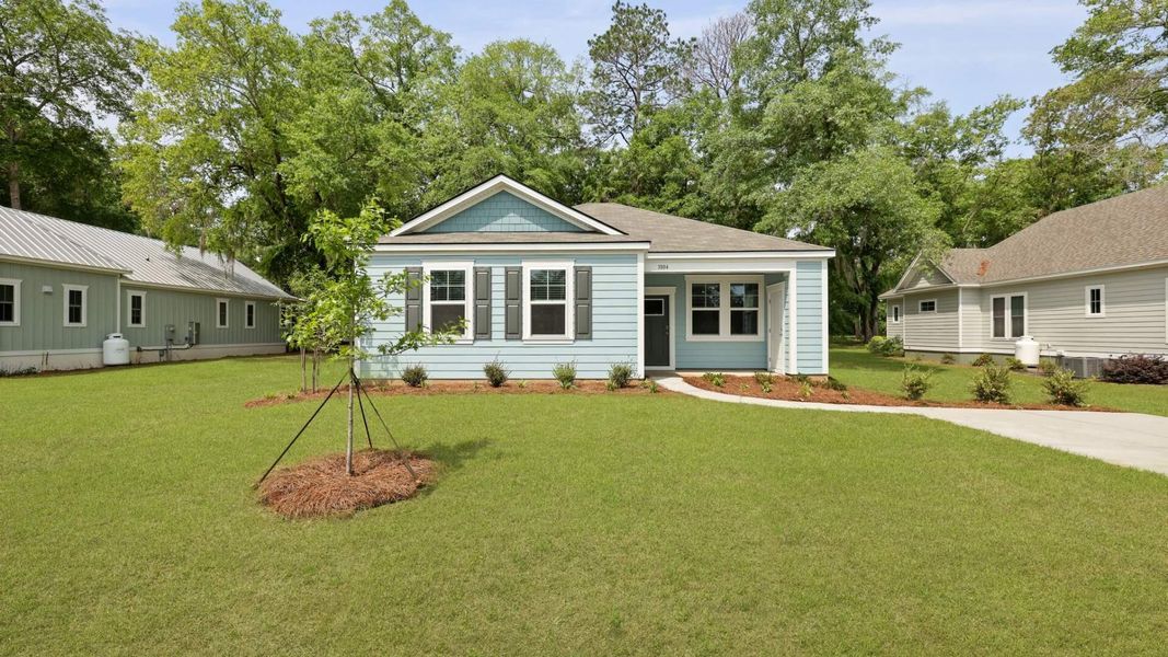 Front exterior of a new home in North Shore, Summerton, SC, highlighting curb appeal (Image 18).