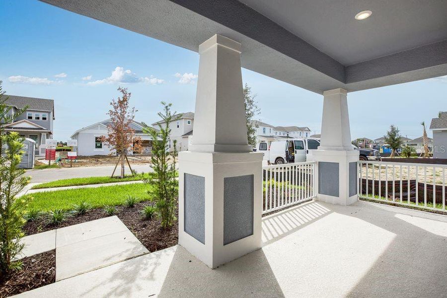 Exterior details and patio area of a home in Indigo Creek, Apollo Beach (Image 30).