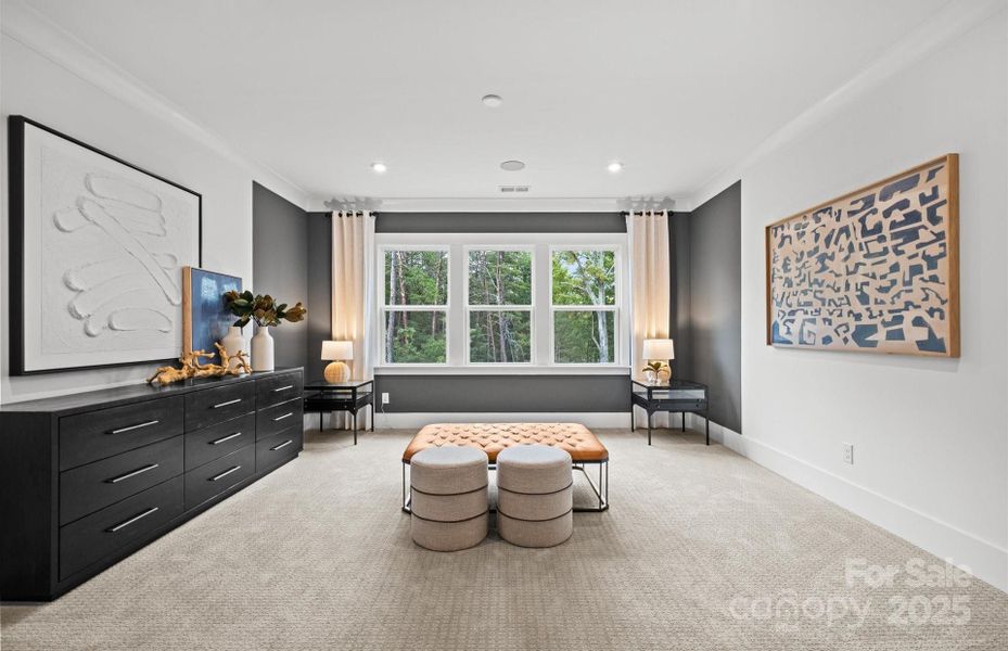 Second floor game room with closet storage.  Representative photo