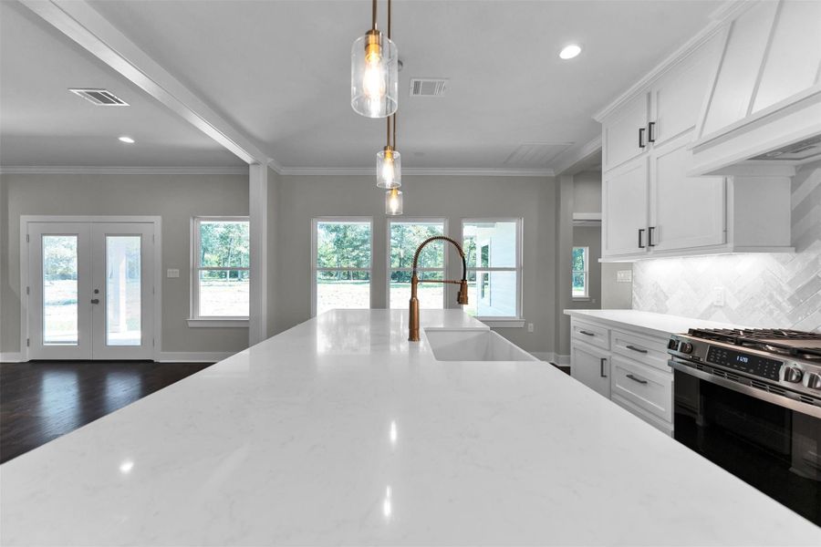 Furnished interior view inside a new home in , New Waverly (Image 6).