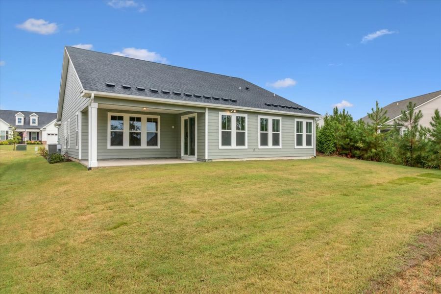 Exterior details and patio area of a home in Sinclair at Crawford Creek, Grovetown (Image 4).