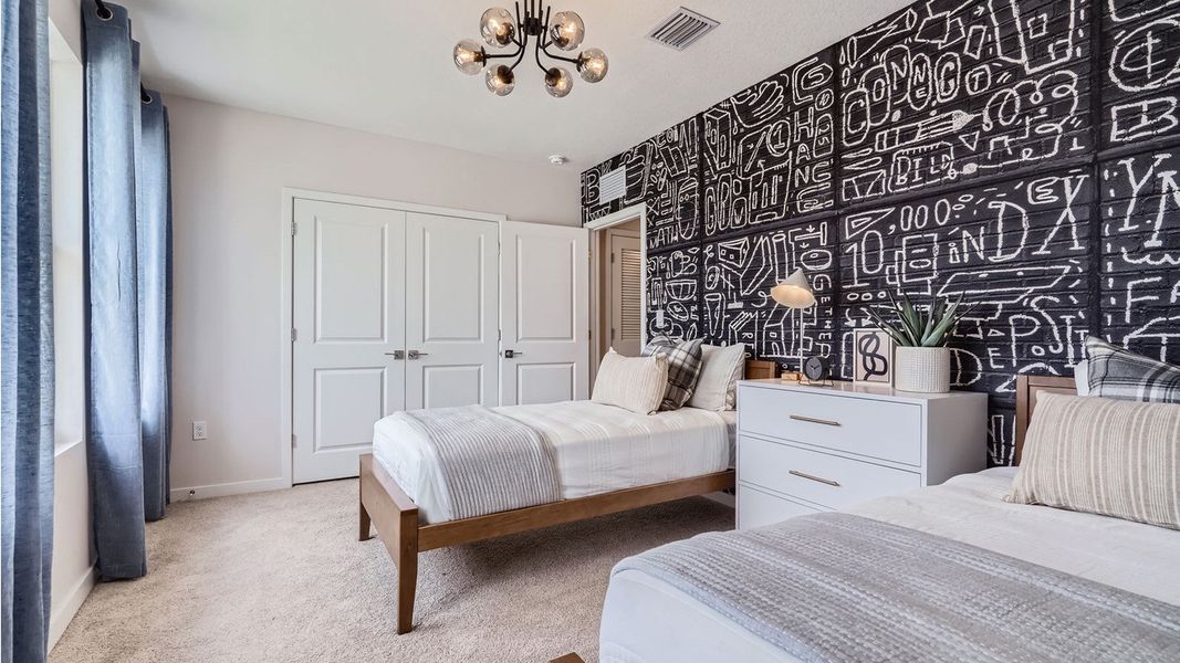 Representative furnished interior of a home built from the Grandcourt by D.R. Horton in Parker Pointe, Homestead (Image 27).