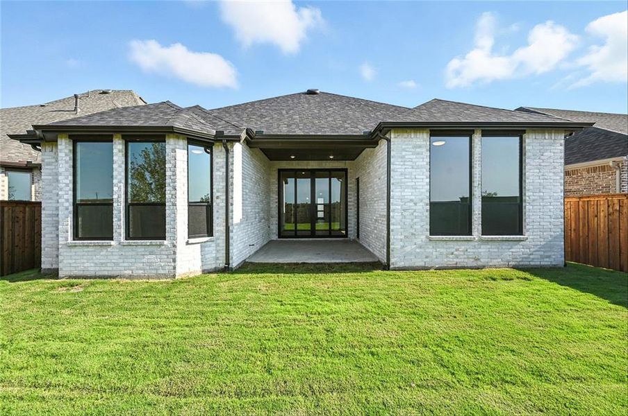 Front exterior of a new home in Trinity Falls, McKinney, TX, highlighting curb appeal (Image 2). Front exterior of a new home in Trinity Falls, McKinney, TX, highlighting curb appeal (Image 2).