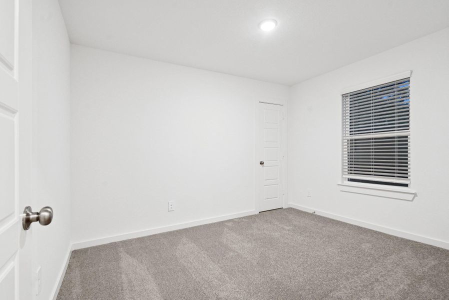 Spacious, unfurnished interior of a new home in Pinewood at Grand Texas, New Caney (Image 4).