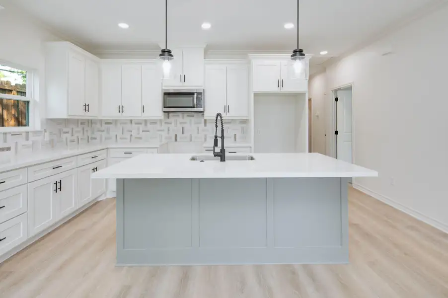 **Photos are of a previously built home with the same floorplan. Finishes are similar but not exact.