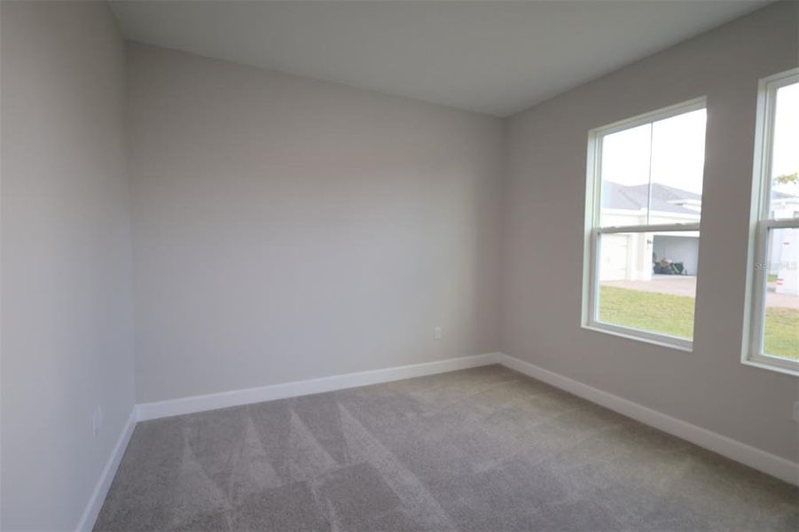 Spacious, unfurnished interior of a new home in Hawk's Overlook, Oviedo (Image 9).