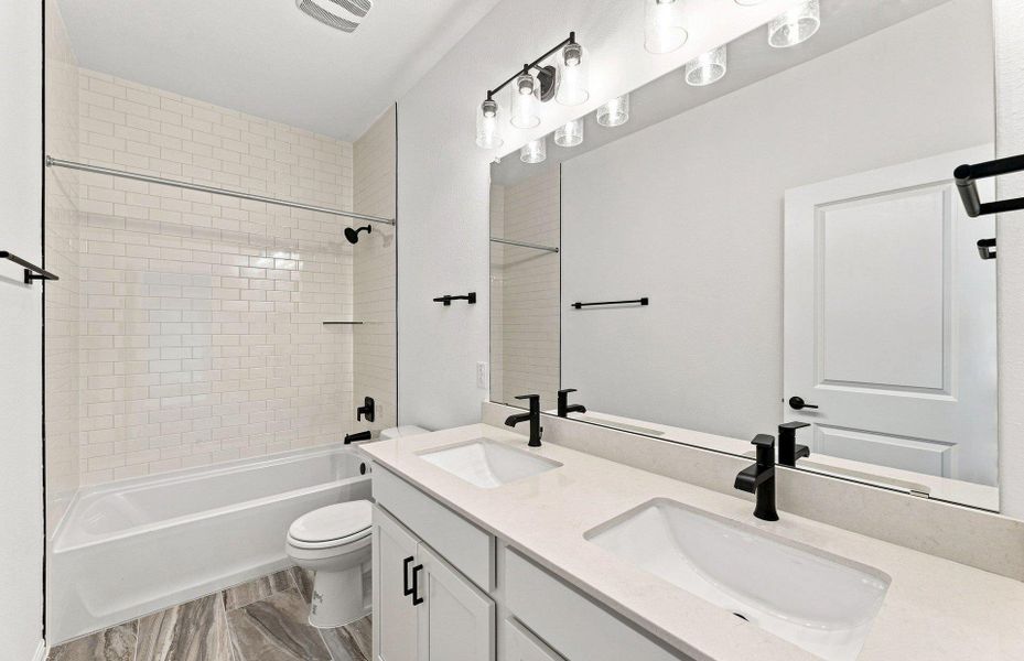 Furnished interior view inside a new home in Bluffview Reserve, Leander (Image 14).