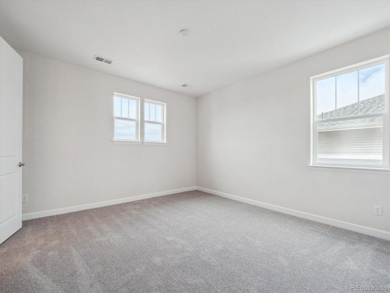 Spacious, unfurnished interior of a new home in Vista Pines at Crystal Valley, Castle Rock (Image 24).