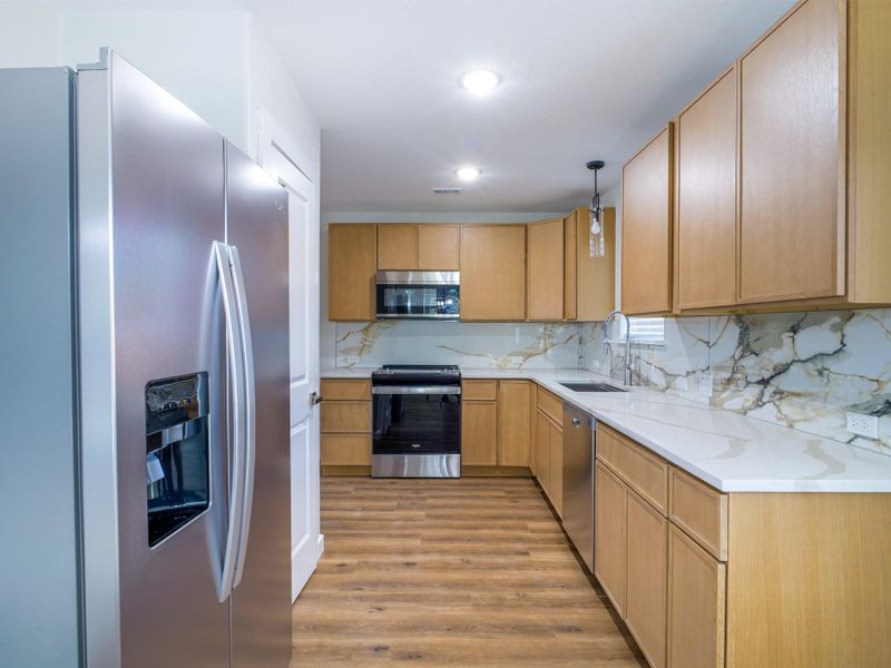 Furnished interior view inside a new home in , Granite Shoals (Image 6).