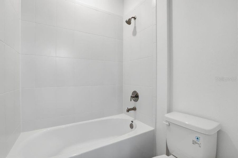 Furnished interior view inside a new home in Center Lake Ranch Community Group Page, St. Cloud (Image 11).