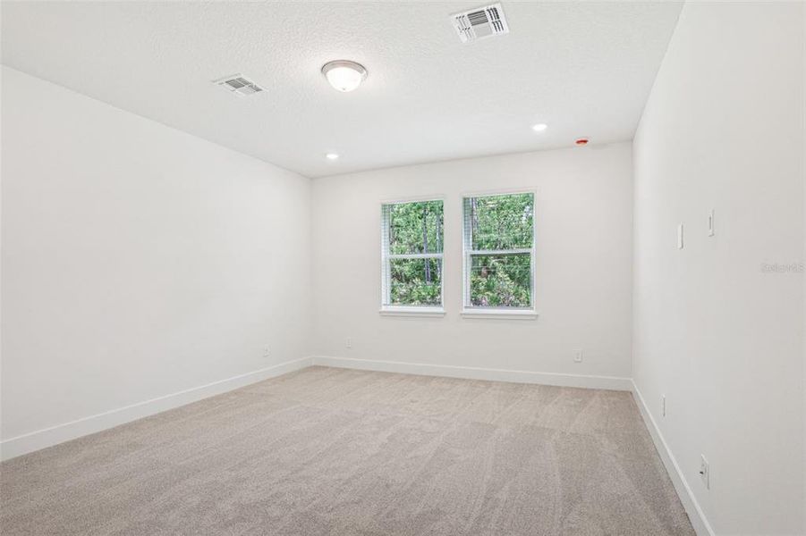 Spacious, unfurnished interior of a new home in Ridgehaven - Signature Series, Ormond Beach (Image 16).