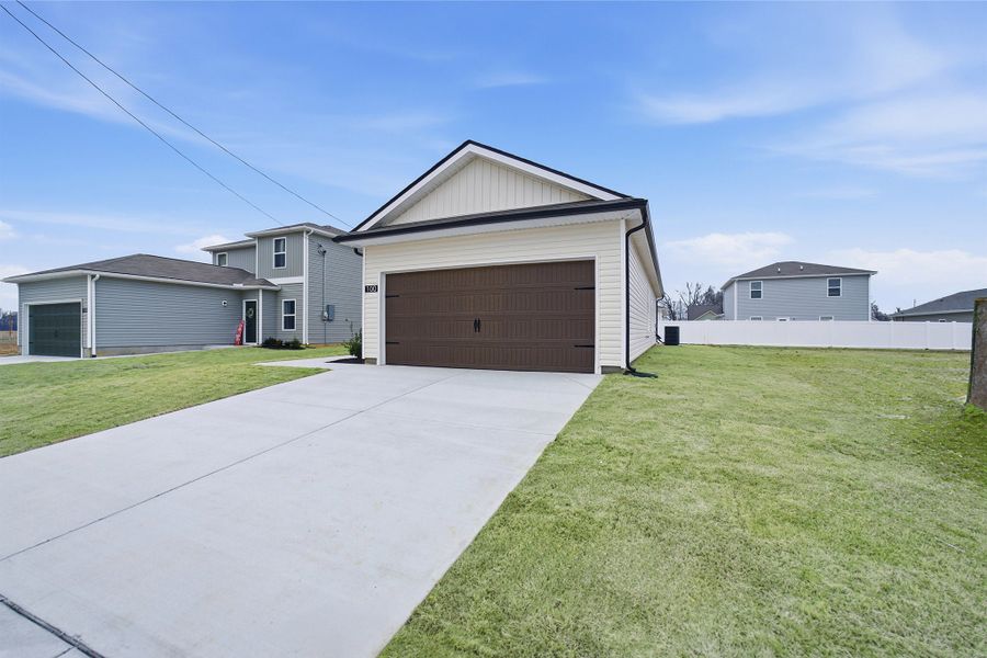 Front exterior of a new home in Stonehenge, Manchester, TN, highlighting curb appeal (Image 18). Front exterior of a new home in Stonehenge, Manchester, TN, highlighting curb appeal (Image 18).