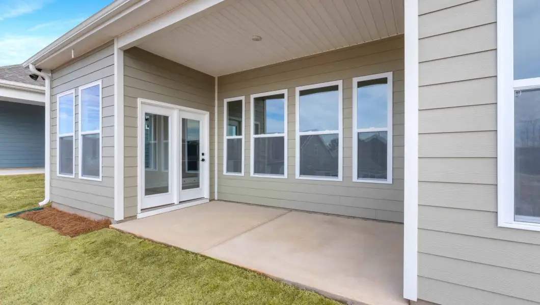 Exterior details and patio area of a home in Alder Pond, Campobello (Image 3).