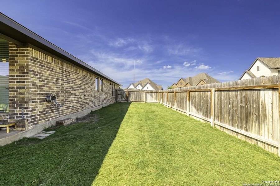 Front exterior of a new home in The Village of Mill Creek 50', Seguin, TX, highlighting curb appeal (Image 26).