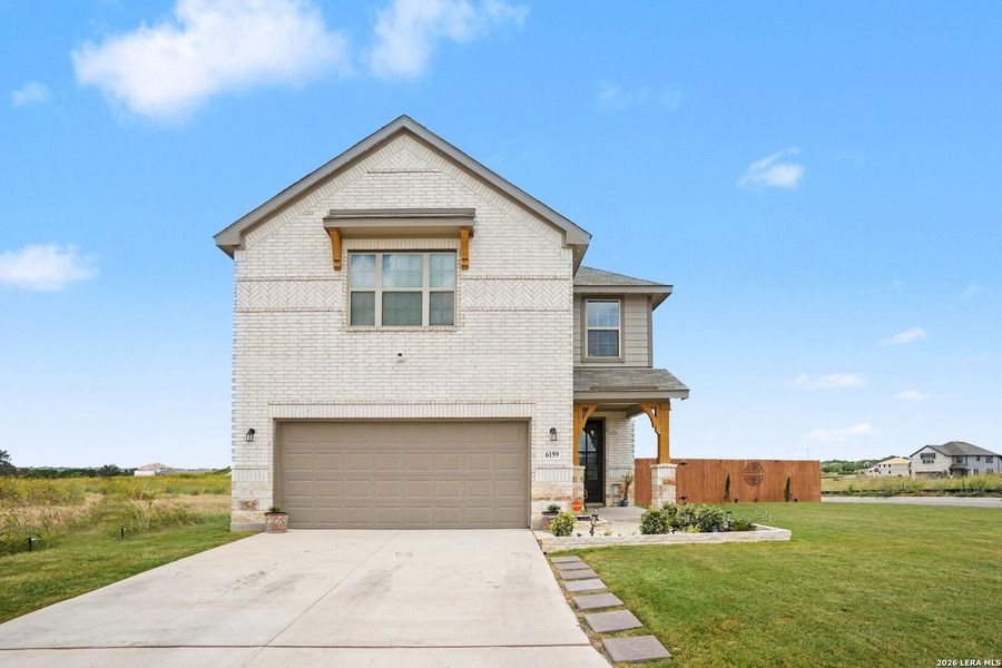 Front exterior of a new home in , San Antonio, TX, highlighting curb appeal (Image 21). Front exterior of a new home in , San Antonio, TX, highlighting curb appeal (Image 21).